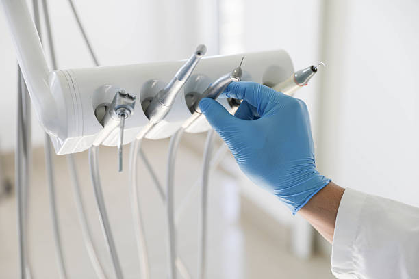 Professional Tooth Extraction technician working in New Chicago, IN